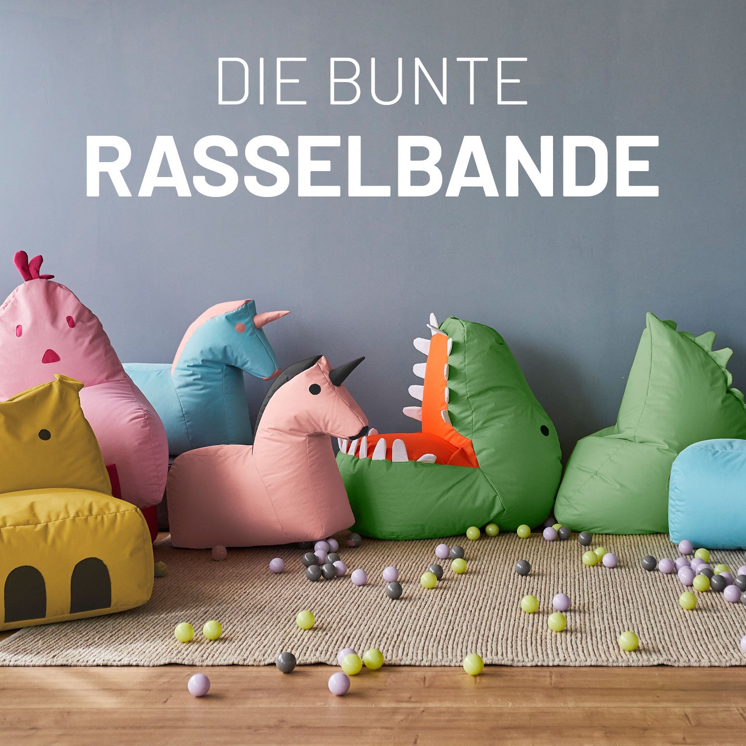 Kindersitzsäcke aus der Animial Line in einem Kinderzimmer: Hippo, Chick, Einhorn, Dino und Monster.