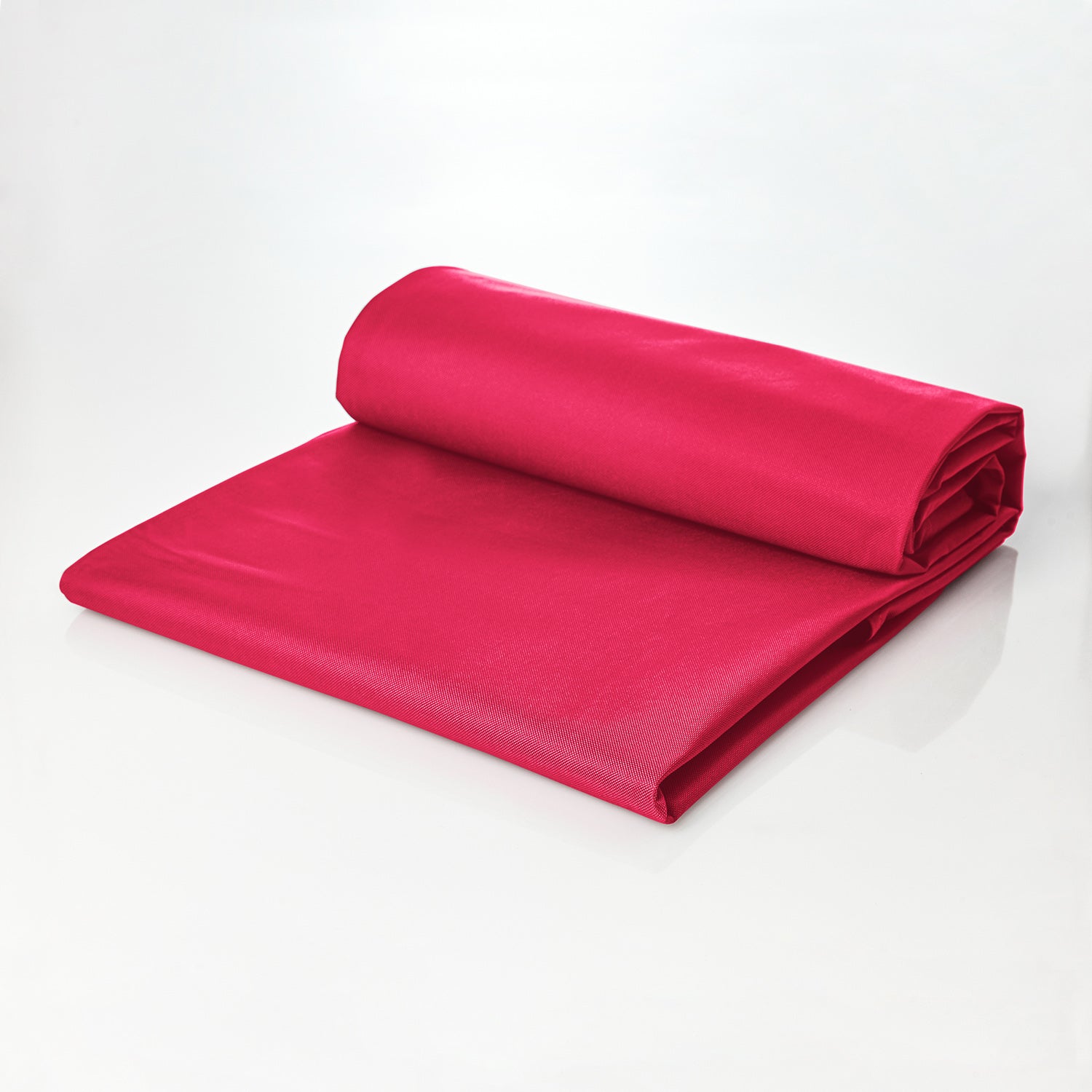 Sitzsackhülle für den LUMALAND XXL-Sitzsack in Pink, halb aufgerollt, halb ausgebreitet.