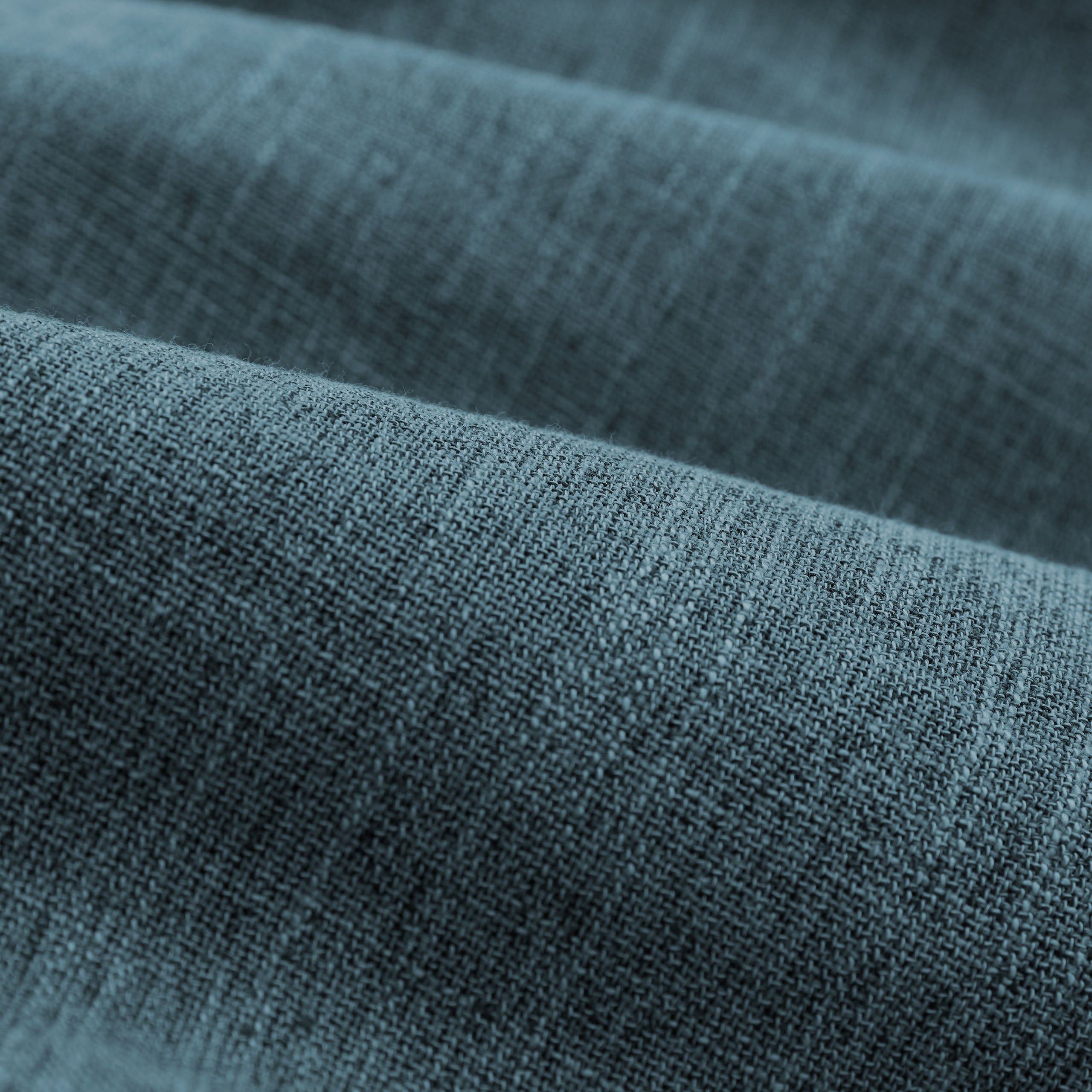 Detailansicht des Stoffes vom LUMALAND Sitzsack Dreieckig 2 in 1 aus der Interior Line in Aquamarin.