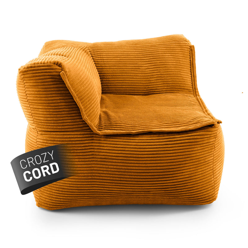 LUMALAND CORD-Sitzsack Eckteil links in Senfgelb aus der Reihe Modulares System vor weißem Hintergrund.