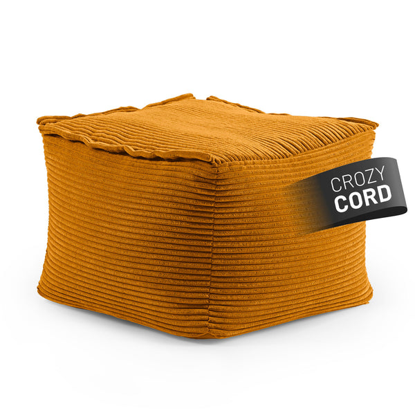 LUMALAND CORD-Hocker/Pouf in Senfgelb aus der Reihe Modulares System vor weißem Hintergrund.