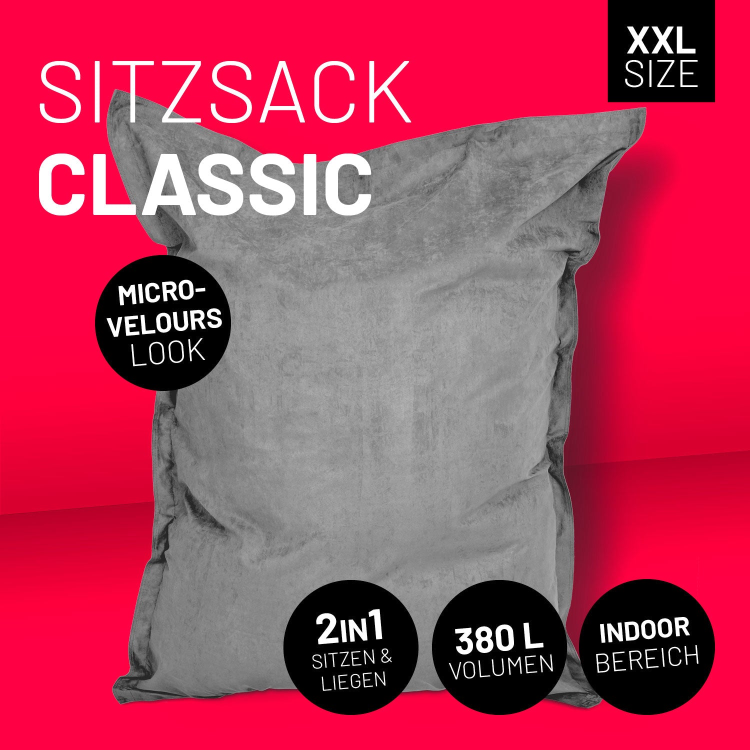 Grauer XXL-Sitzsack im Microvelours-Look vor pinkem Hintergrund, mit Icons "380 L Volumen", "Indoor-Bereich" und "2-in-1 Sitzen & Liegen".